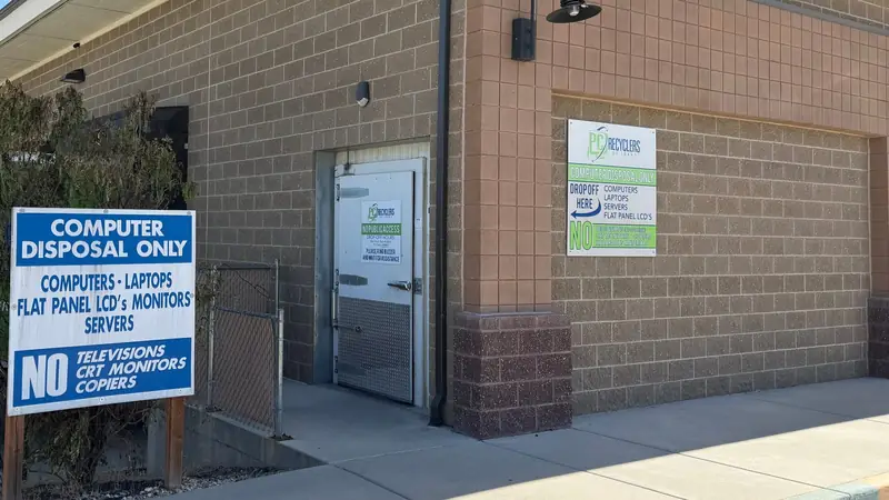 The PC Recyclers of Idaho drop-off door and signs listing the computer equipment we accept