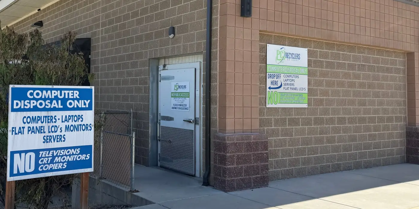 The PC Recyclers of Idaho drop-off door and signs listing the computer equipment we accept